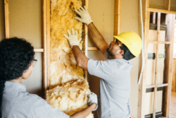 installing insulation for home weatherization